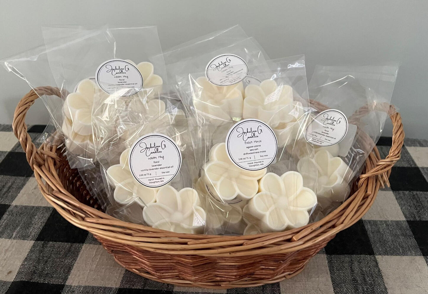 Image is of a basket of packaged wax melts.